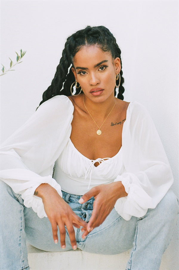 Whimsical Off - White Super Lightweight Sorrell Bodysuit with Unique Design