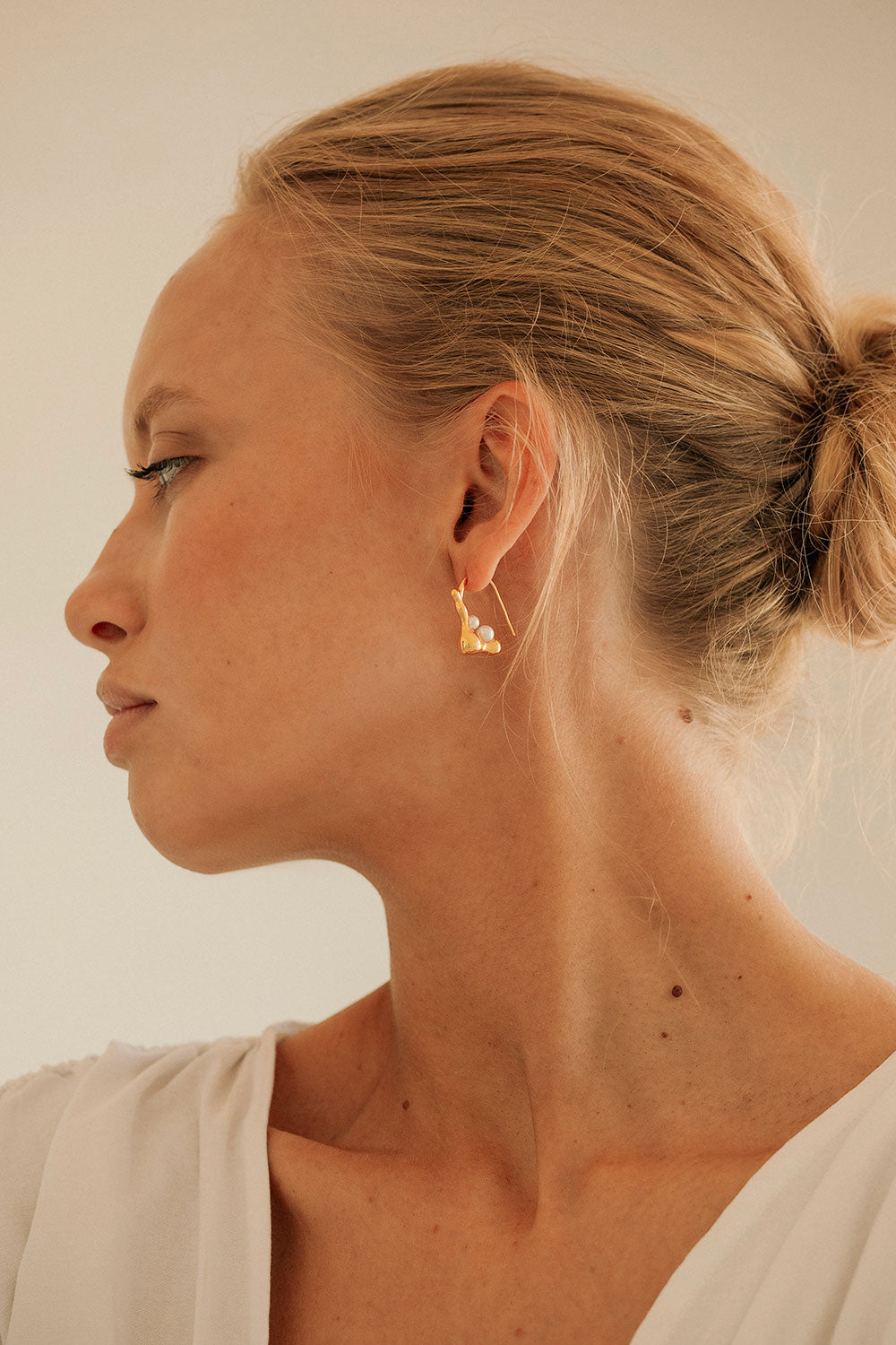 Stylish Gold-Toned Twin Mini Pearl Asymmetric Twist Tao Earrings