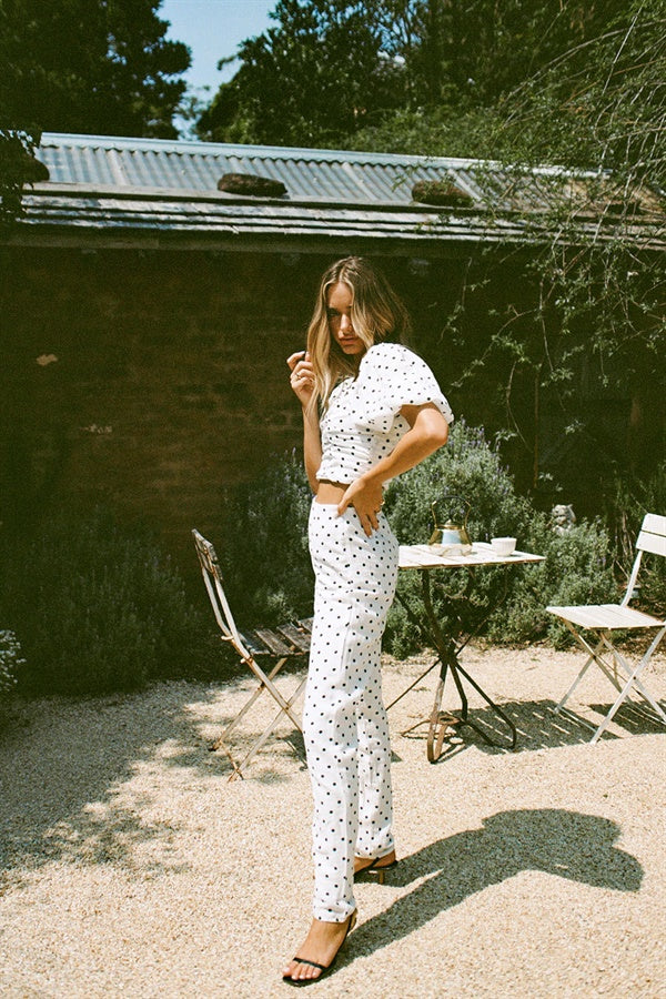 Chic Off-White Crepe Lane Pants with Black Spots