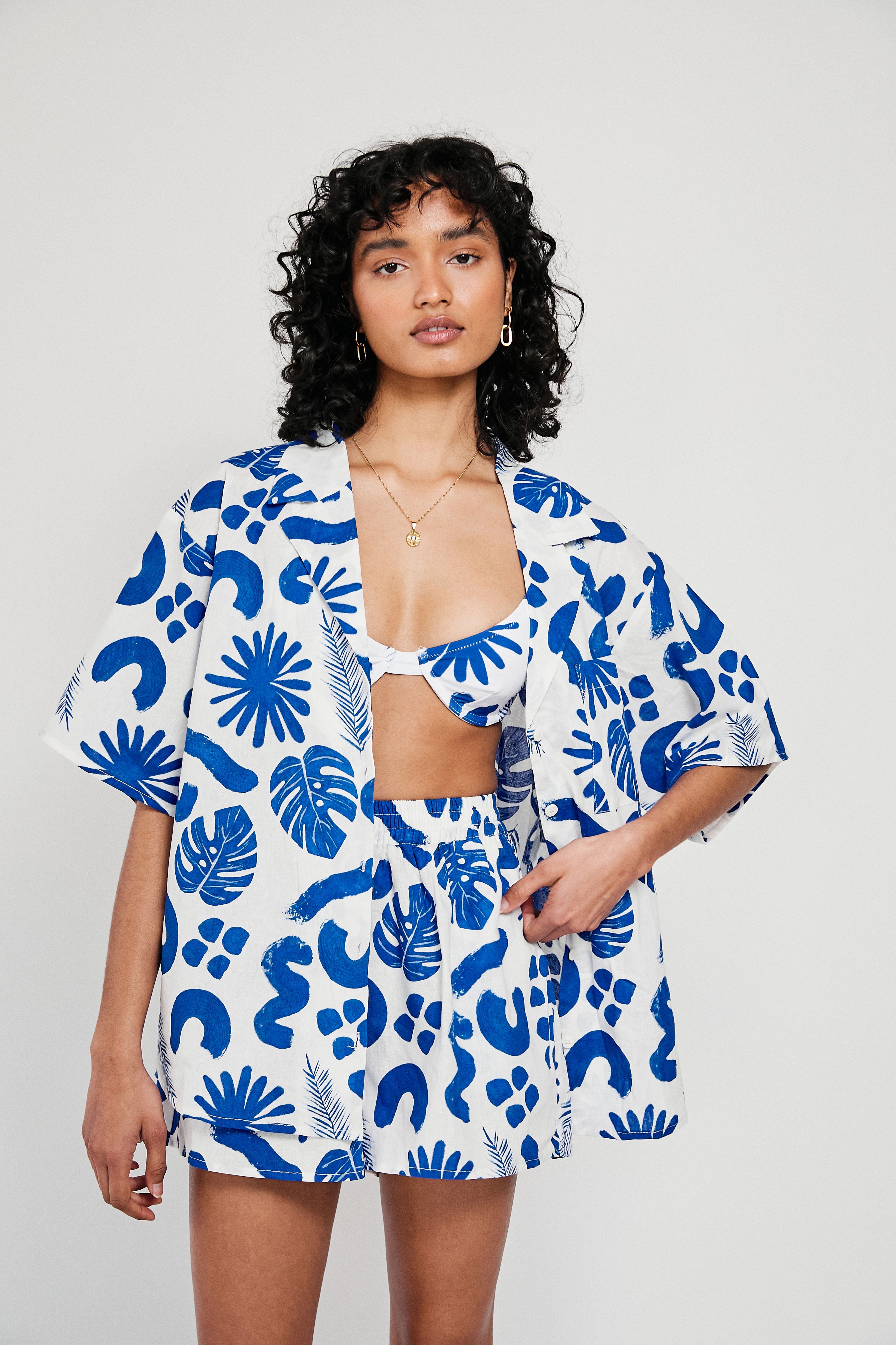 Unique Thessy Women's Top with Blue Leaf Pattern