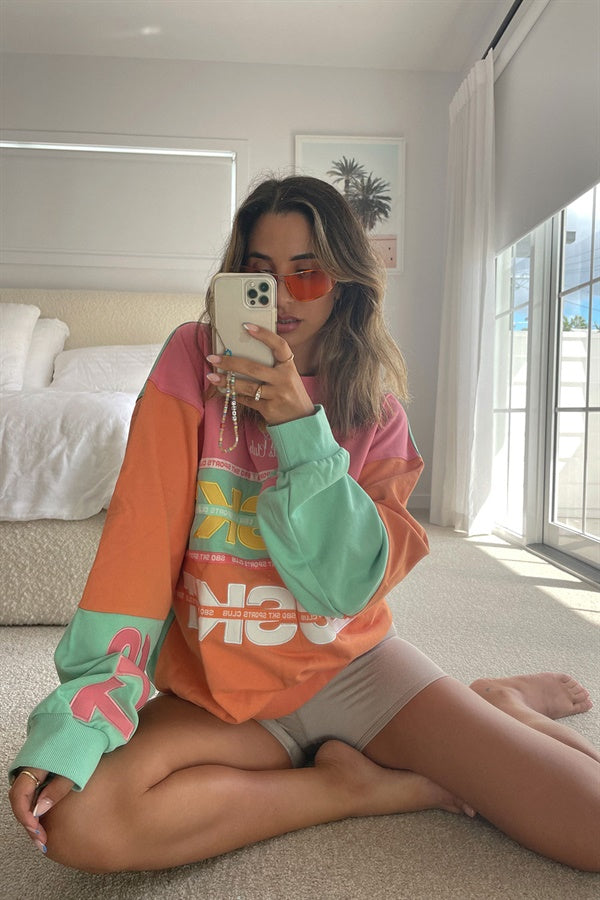 Stylish Nakia Women's Orange Oversized Sweater