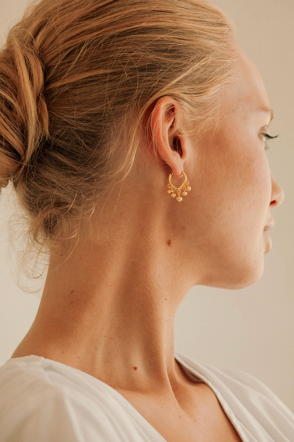 Gorgeous Gold - toned Ziva Drop Ball Earrings for Stylish Look