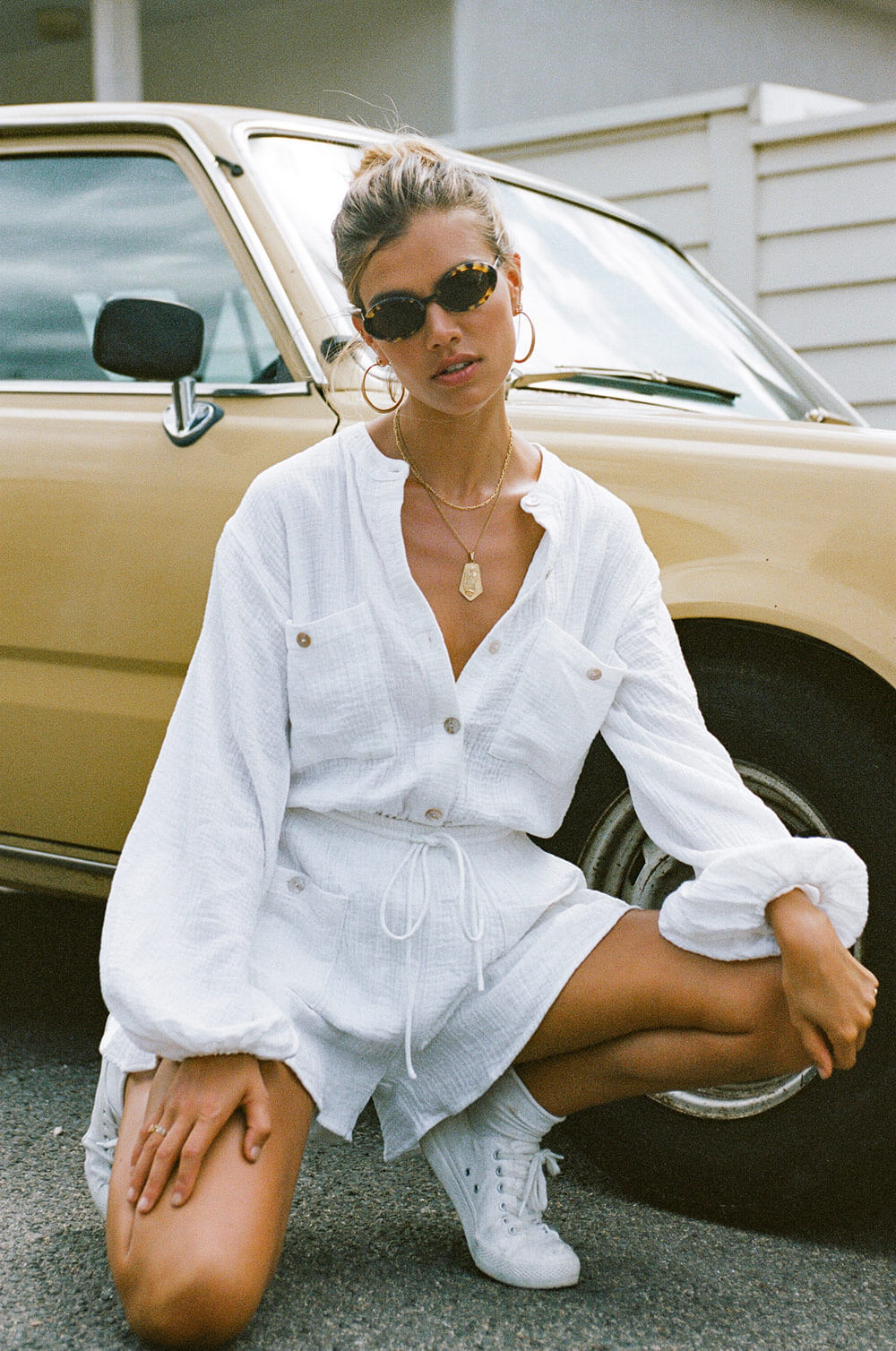 Estelle White Textured Cotton One - piece Playsuit for Easy Wear