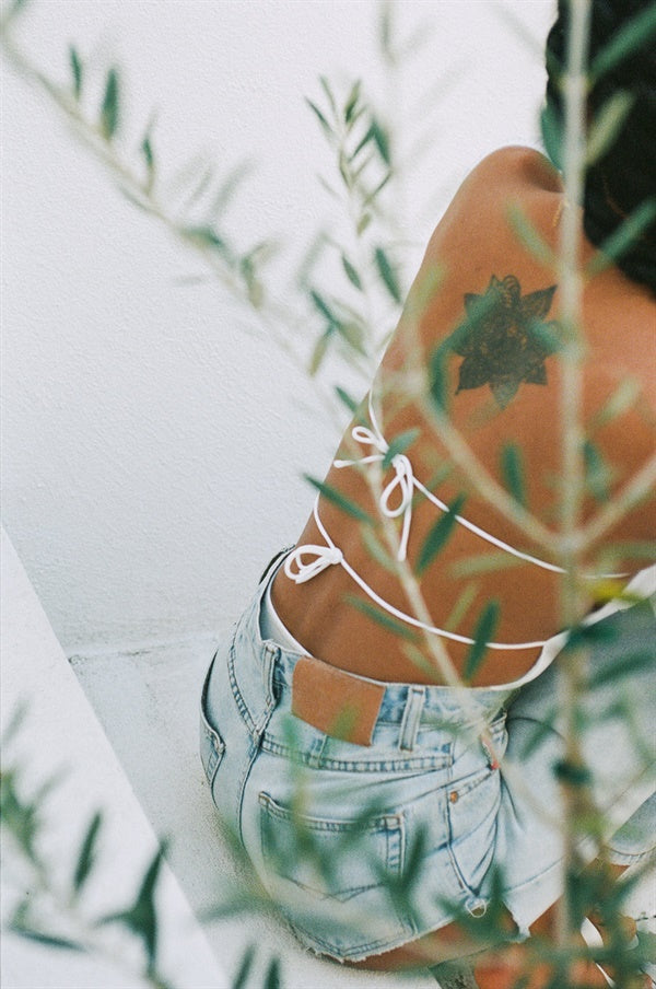 Whimsical Off - White Super Lightweight Sorrell Bodysuit with Unique Design