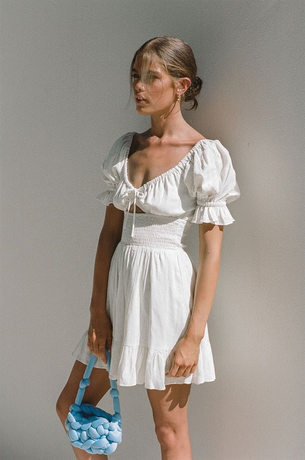 Exclusive White Moxxi Dress - A Unique Fashion Sample