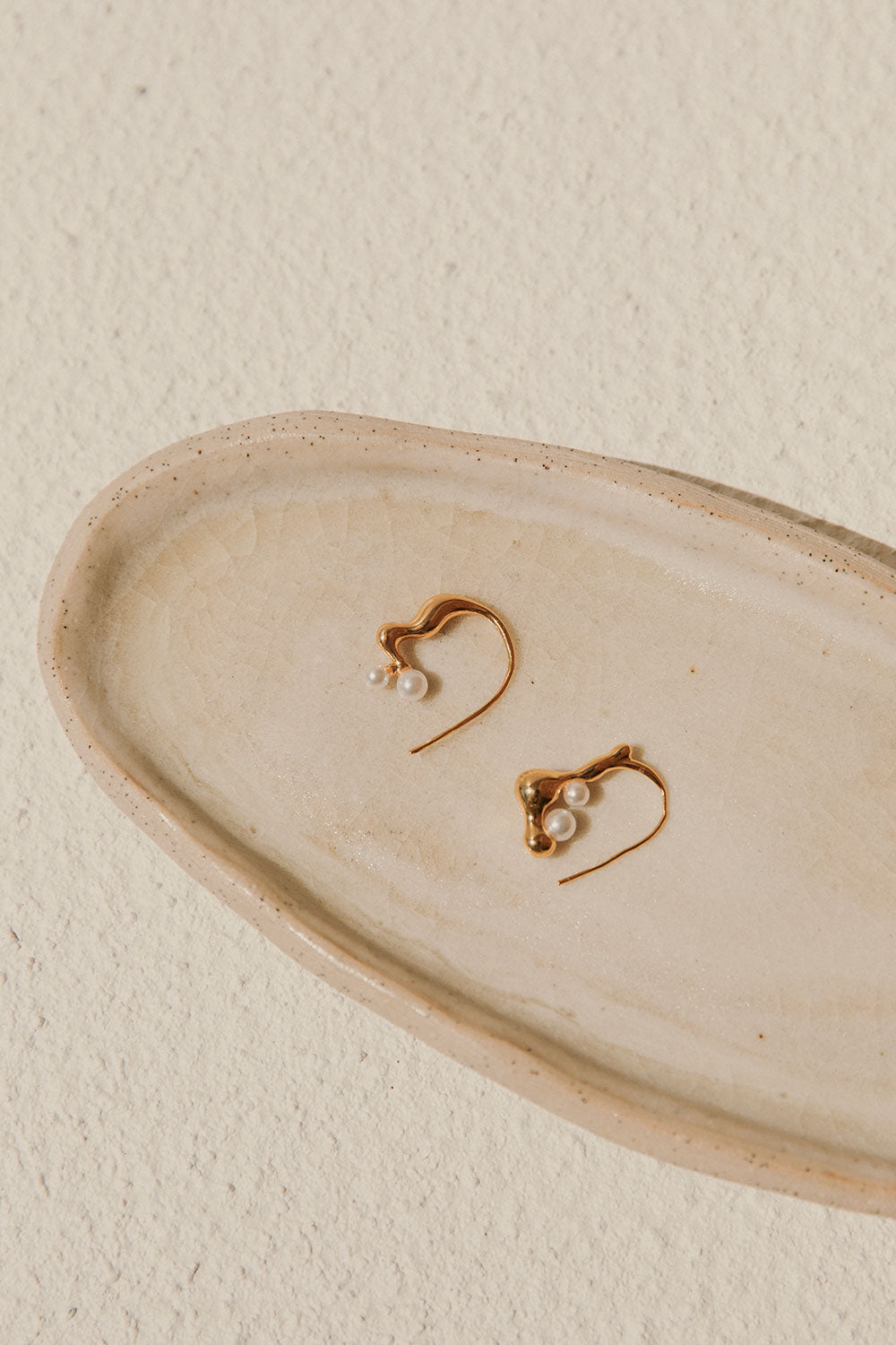 Stylish Gold-Toned Twin Mini Pearl Asymmetric Twist Tao Earrings