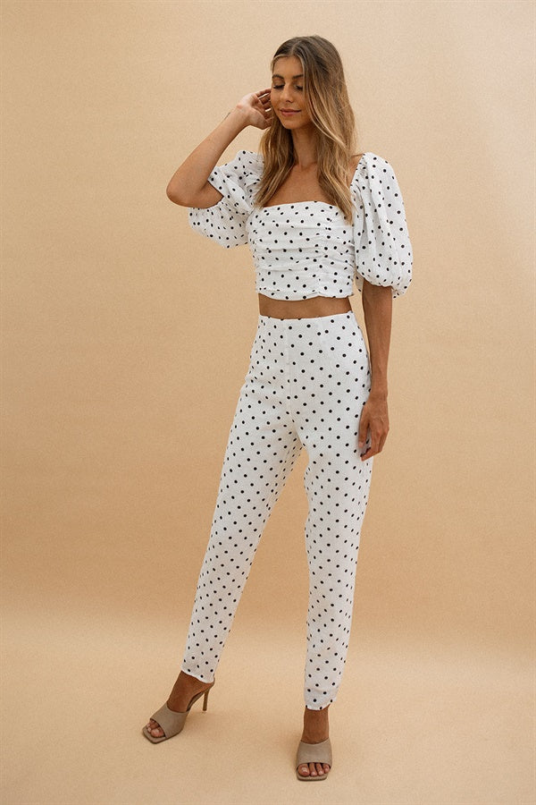 Chic Off-White Crepe Lane Pants with Black Spots