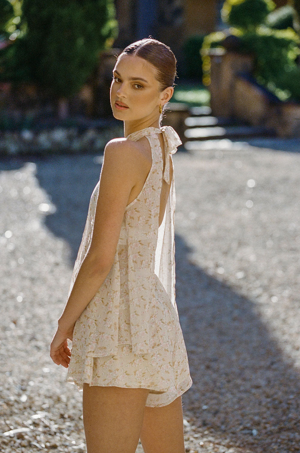 Stylish Floral Cream Kinslee Halter Top with Metallic Stripes