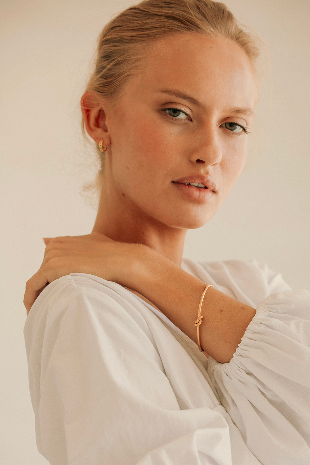 Elegant Gold-Toned Nia Knot Adjustable Open Cuff Bangle