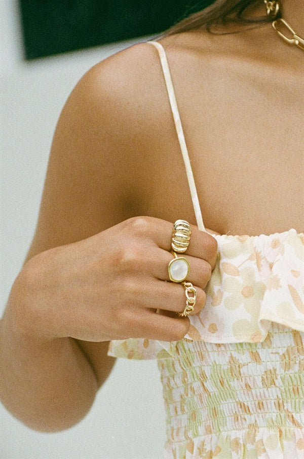 Stylish Gold-Toned Signet Ring with Ivory Centre and Imperfect Edge