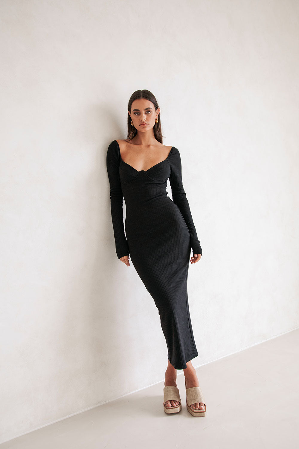 Stylish Black Geneva Dress with Chic Design