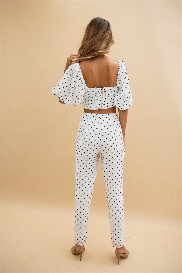 Chic Off-White Crepe Lane Pants with Black Spots