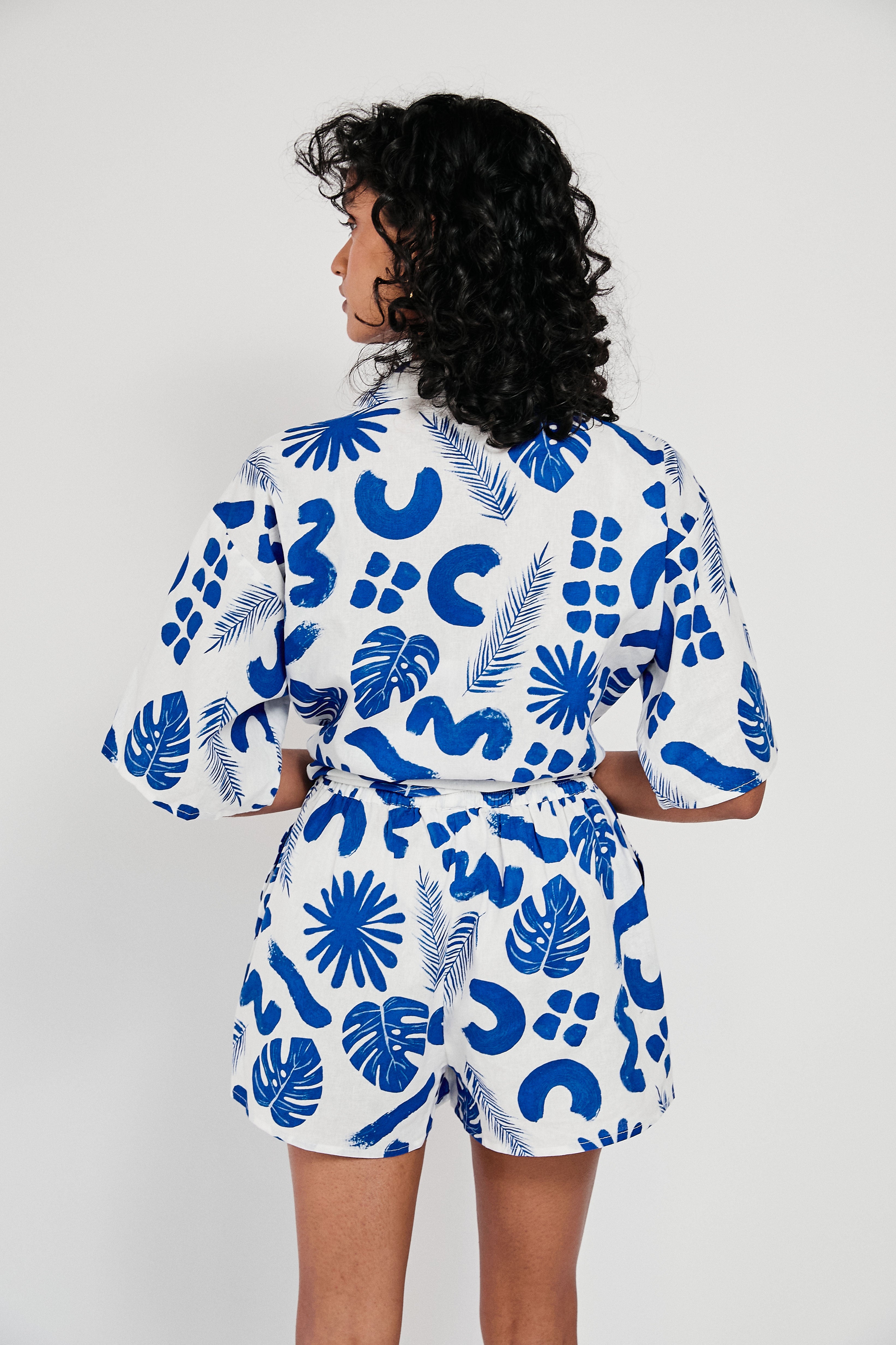 Unique Thessy Women's Top with Blue Leaf Pattern