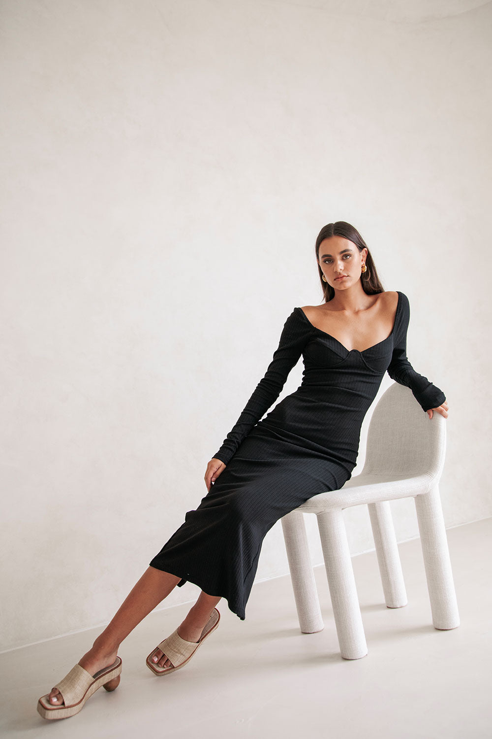 Stylish Black Geneva Dress with Chic Design