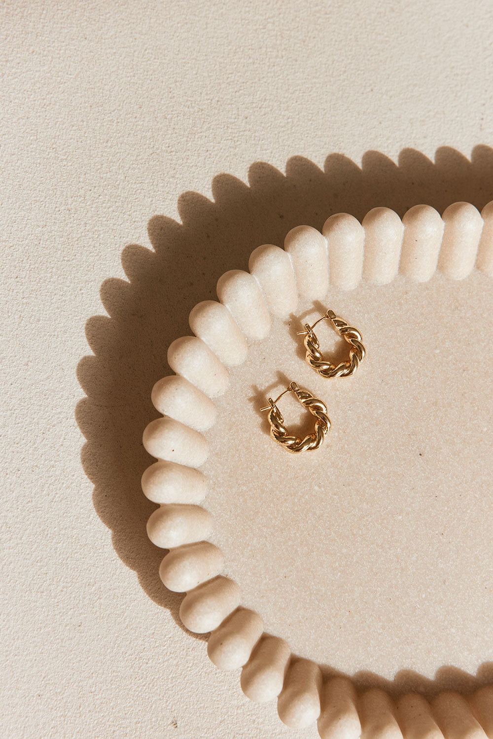 Stylish Gold-Toned Twisted Frida Earrings for a Stunning Look