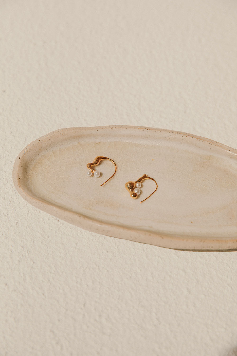 Stylish Gold-Toned Twin Mini Pearl Asymmetric Twist Tao Earrings