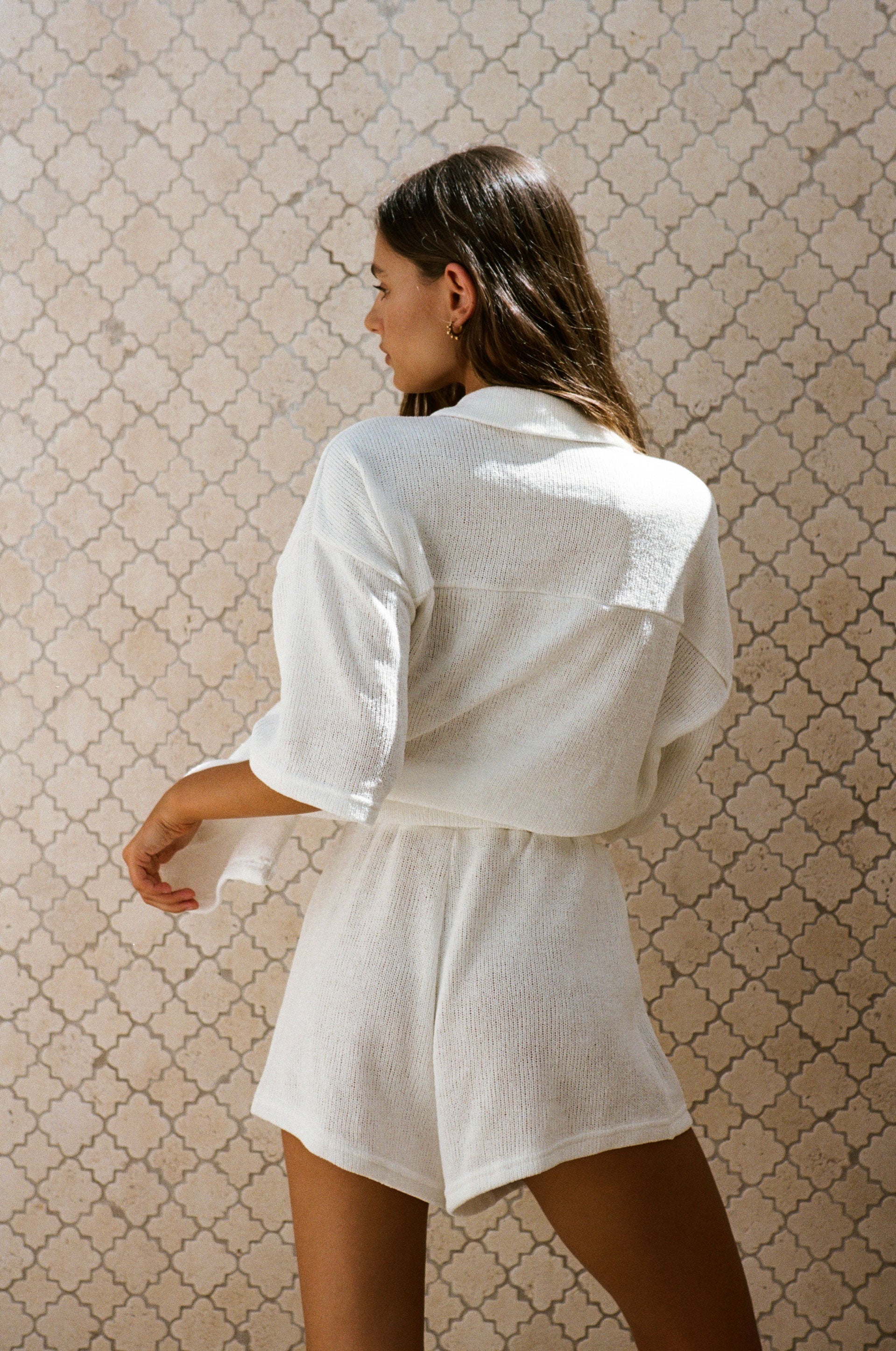 Chic White Knitted Kase Top for Vacation Look