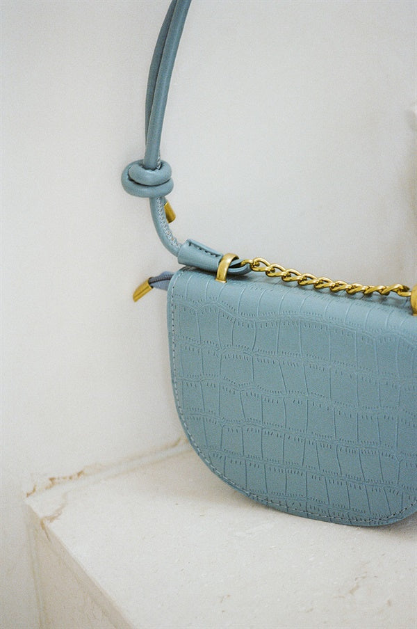 Stylish Blue Lima Vegan Croc Skin Saddle Bag for Fashion Enthusiasts