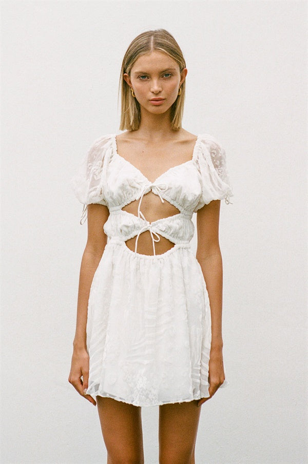 Unique Rizzo Cutout Dress with a Faint Pink Mark