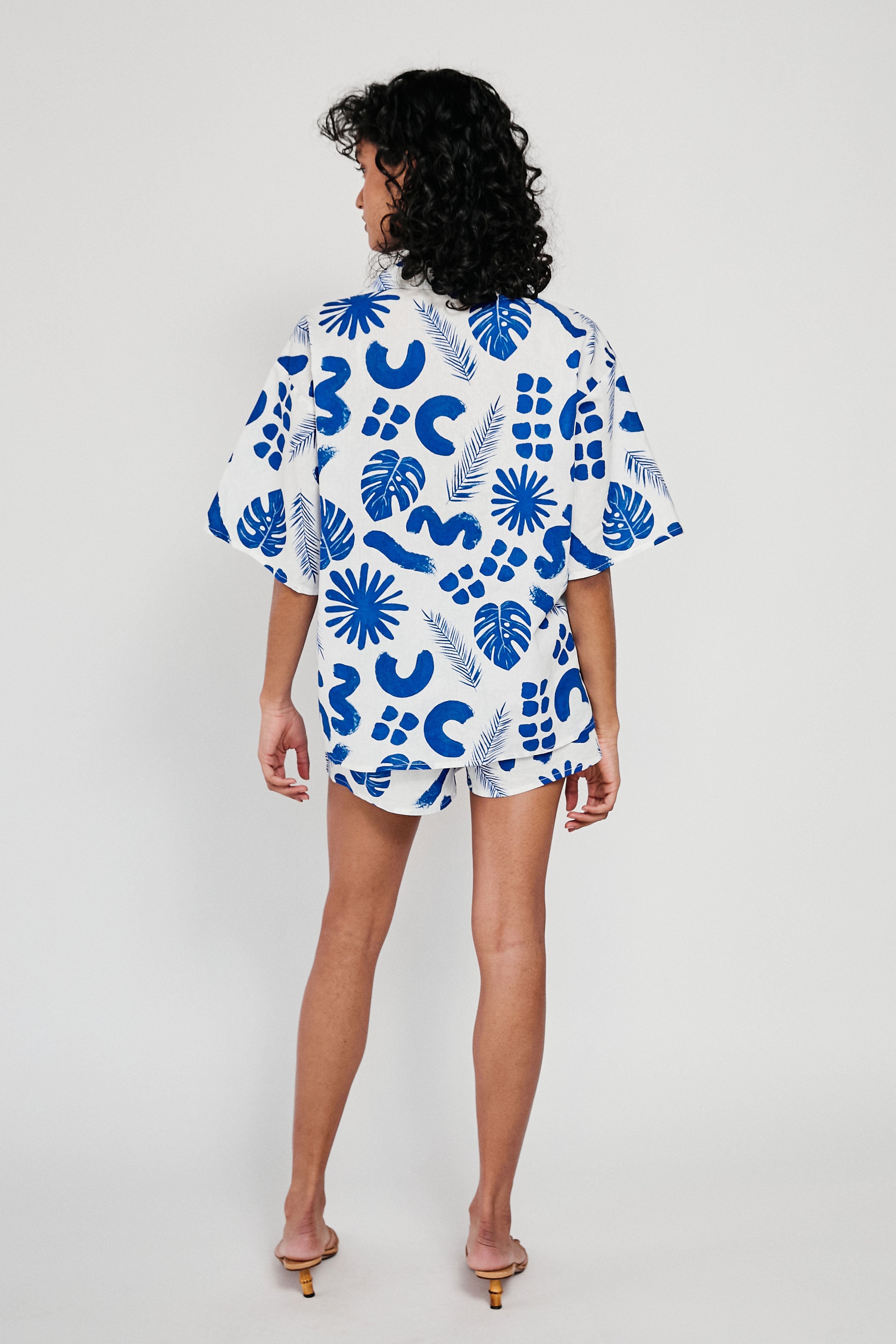Unique Thessy Women's Top with Blue Leaf Pattern