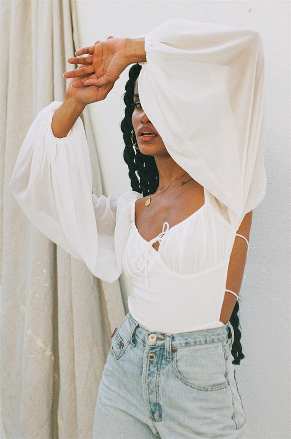 Whimsical Off - White Super Lightweight Sorrell Bodysuit with Unique Design