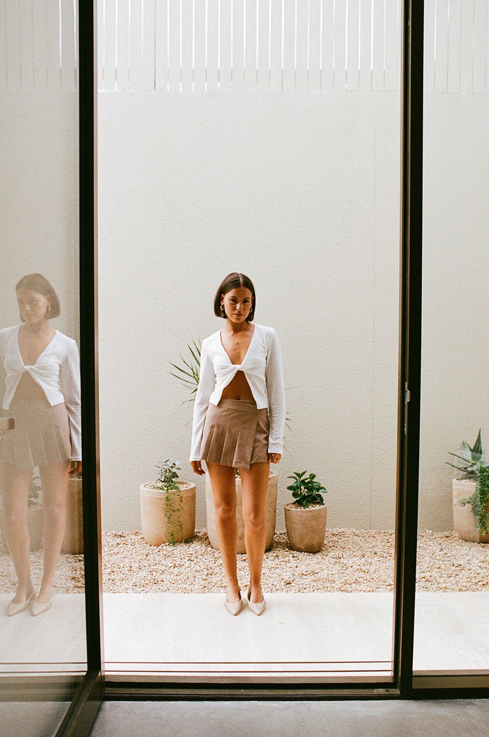 Sabo's Exclusive White Textured Massiel Top with Unique Details