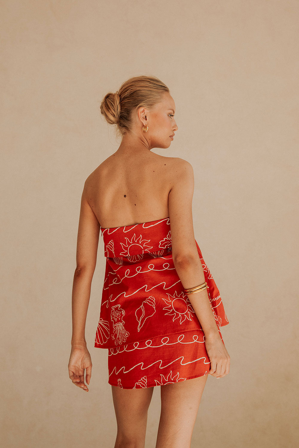 Summer-Inspired Ria Peace Strapless Longline Boxy Top