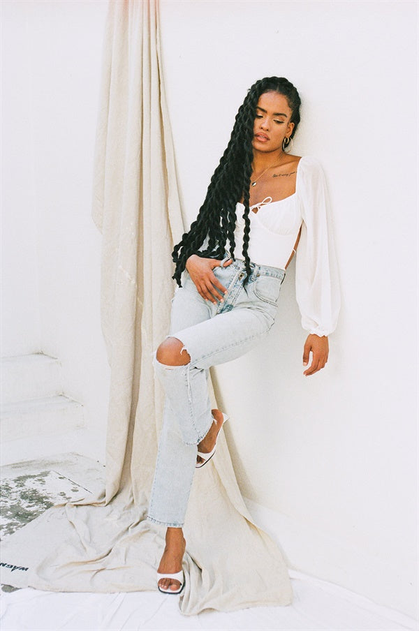 Whimsical Off - White Super Lightweight Sorrell Bodysuit with Unique Design